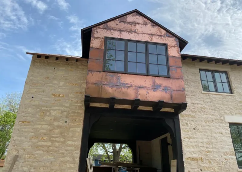 Copper metal panel facade on a stone building for Skylight Installation in Rohnert Park