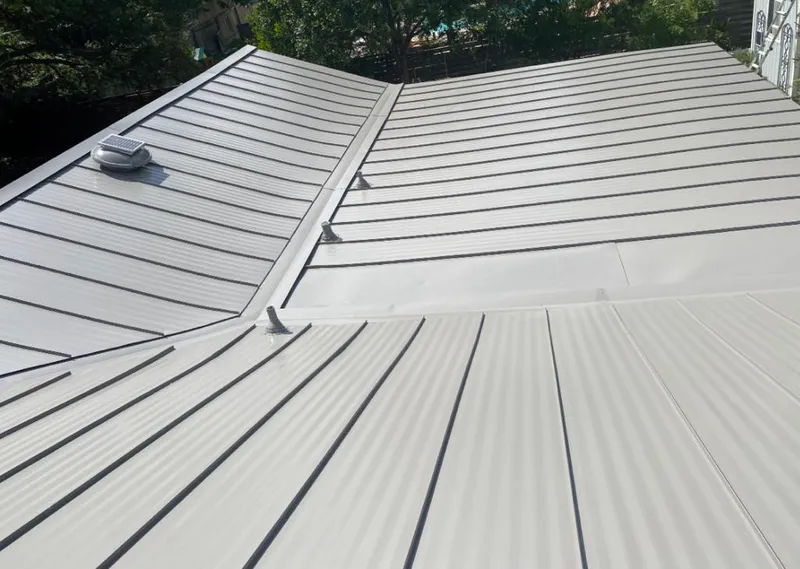 Solar attic fan installed on a metal roof for Roof Ventilation in Rohnert Park